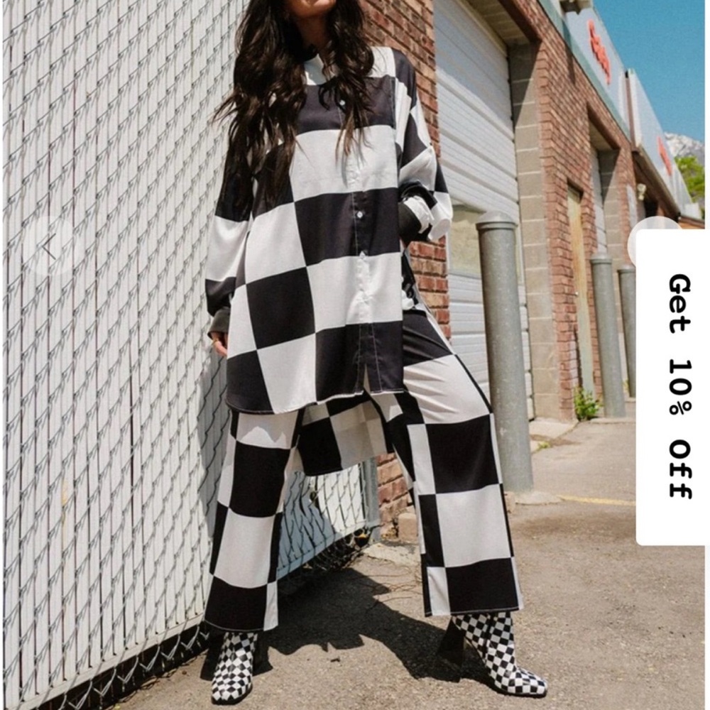 Dressed in LALA Black and White checkers satin playsuit set